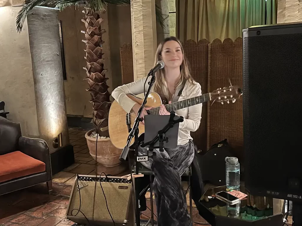 Abbi Berry with guitar